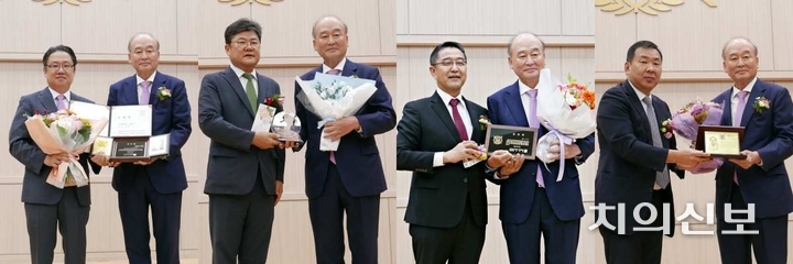 (좌측부터)박영석 대학원장, 이용무 병원장, 김용호 동창회장, 구기태 치주과학교실 주임교수가 구 영 교수에게 공로패와 감사패를 전달했다.